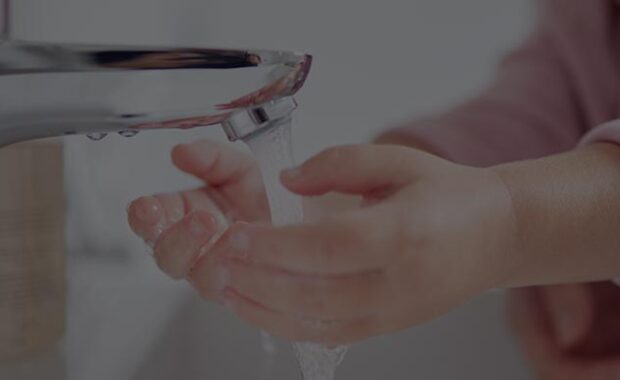 Child Washing Their Hands