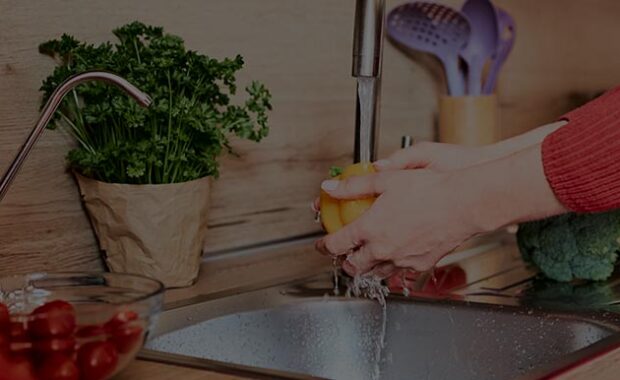 Washing Vegetable In Sink