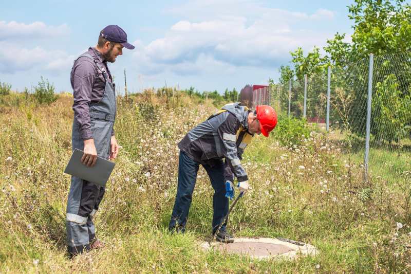 Septic System Maintenance Being Performed