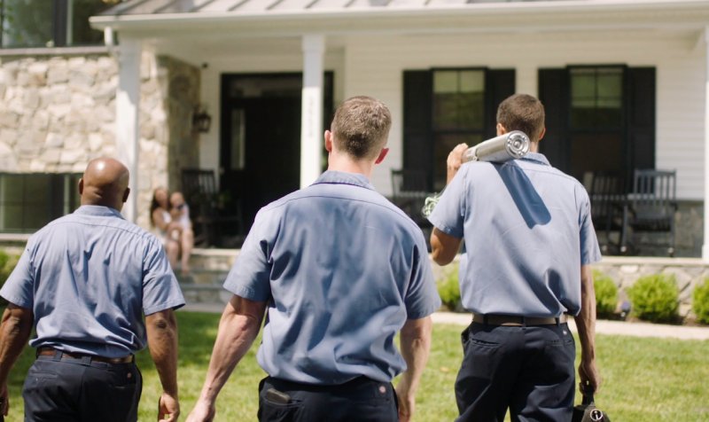 Tri-County Water Treatment Installation & Maintenance Specialists Walking Towards House