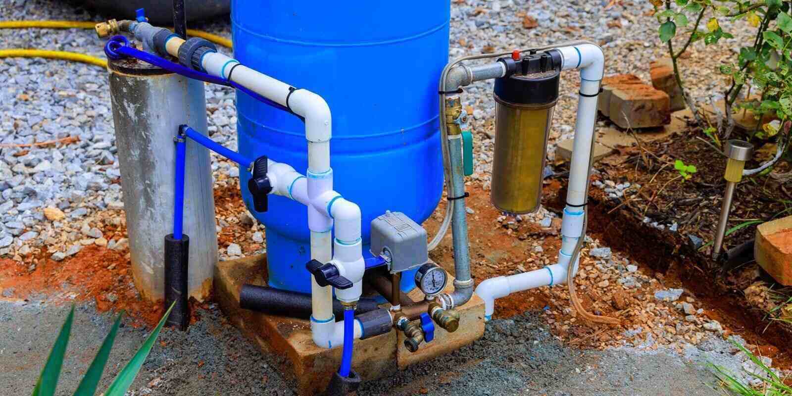 artesian water well system installed outdoors ensuring clean water supply for gardening home use