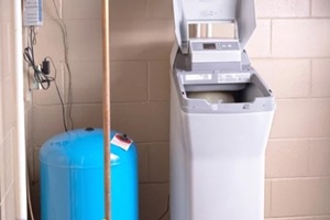 salt based water softener installed in the basement