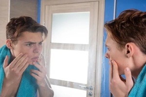 young attractive guy in the bathroom