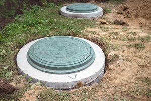 concrete sewage well installing underground of country house