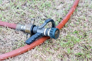 high pressure fire hose nozzle on yard