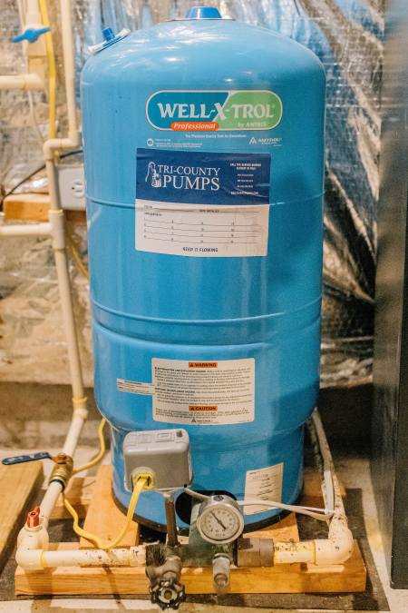 tri county pumps inspecting and maintaining a brand new well pump pressure tank