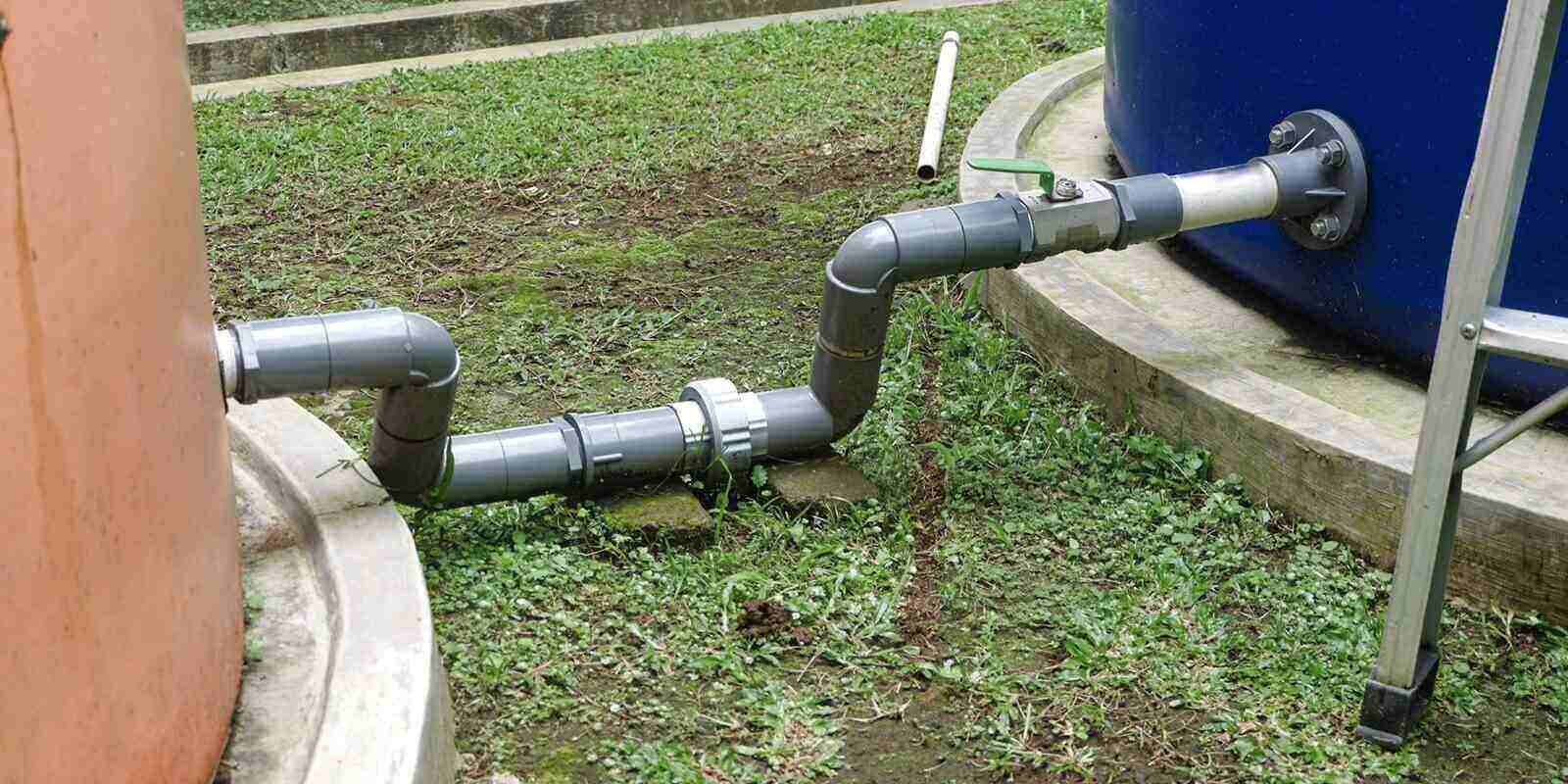 gray PVC pipe connection, including a green ball valve