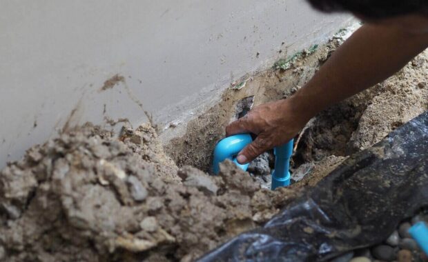 fixing leaking water pipe underground the house by plumber which finding leaked point and take out broken piece and maintenance