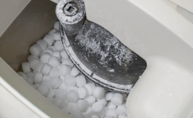 salt pellets lies in water softener