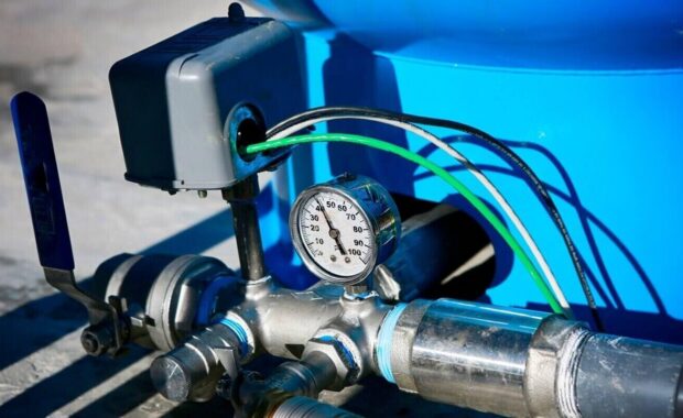 water pressure gauge and storage tank