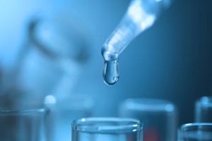 testing water in laboratory closeup